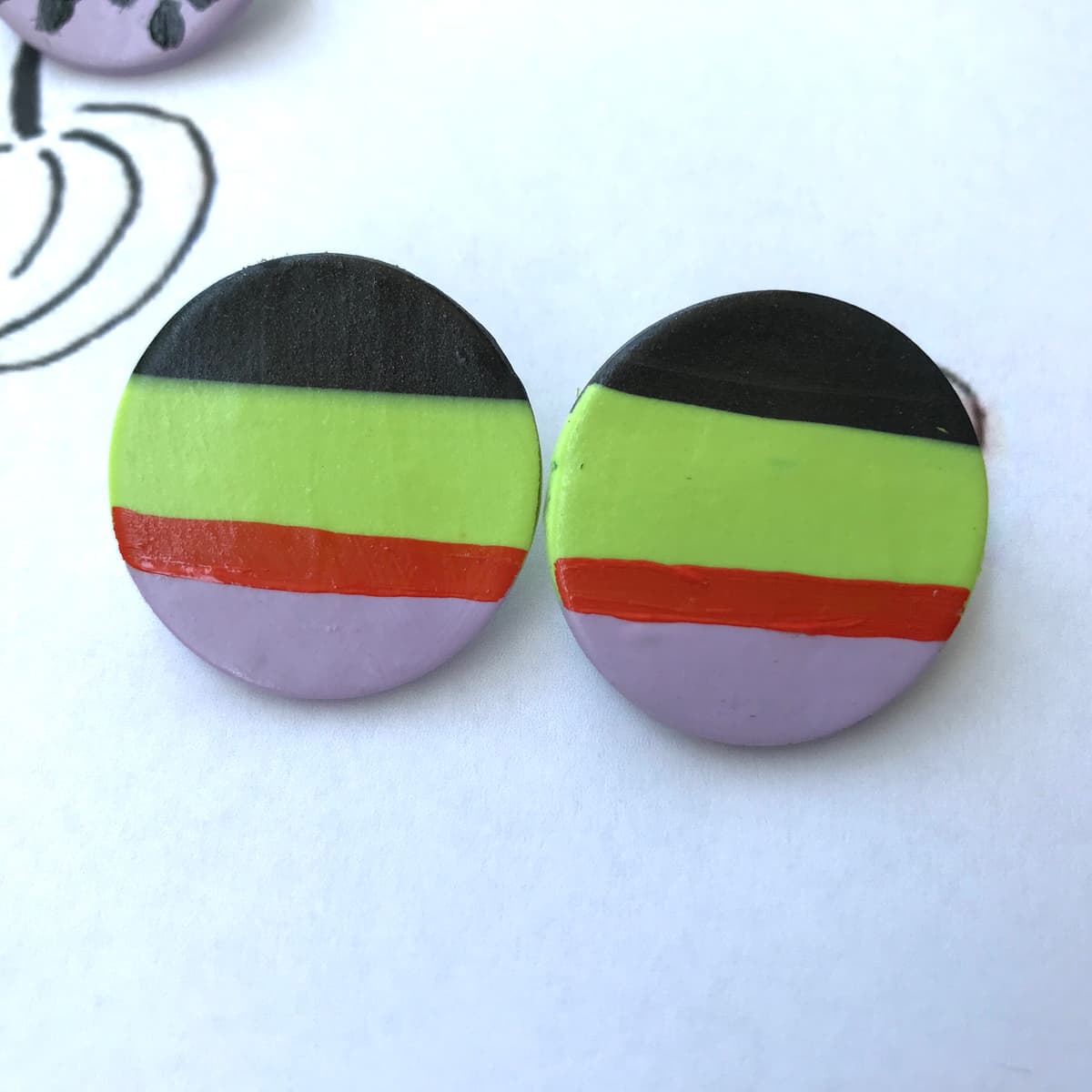 The selected image of Black, Orange, Purple, and Green Striped Large Halloween Polymer Clay Studs