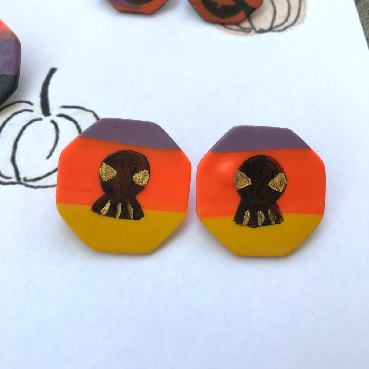 The selected image of Large Striped Skull Polymer Clay Stud Earrings