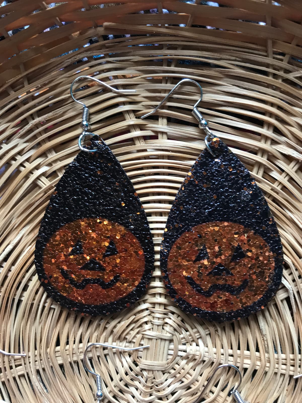 The selected image of Black and Orange Sparkle Jack-o-Lantern Earrings