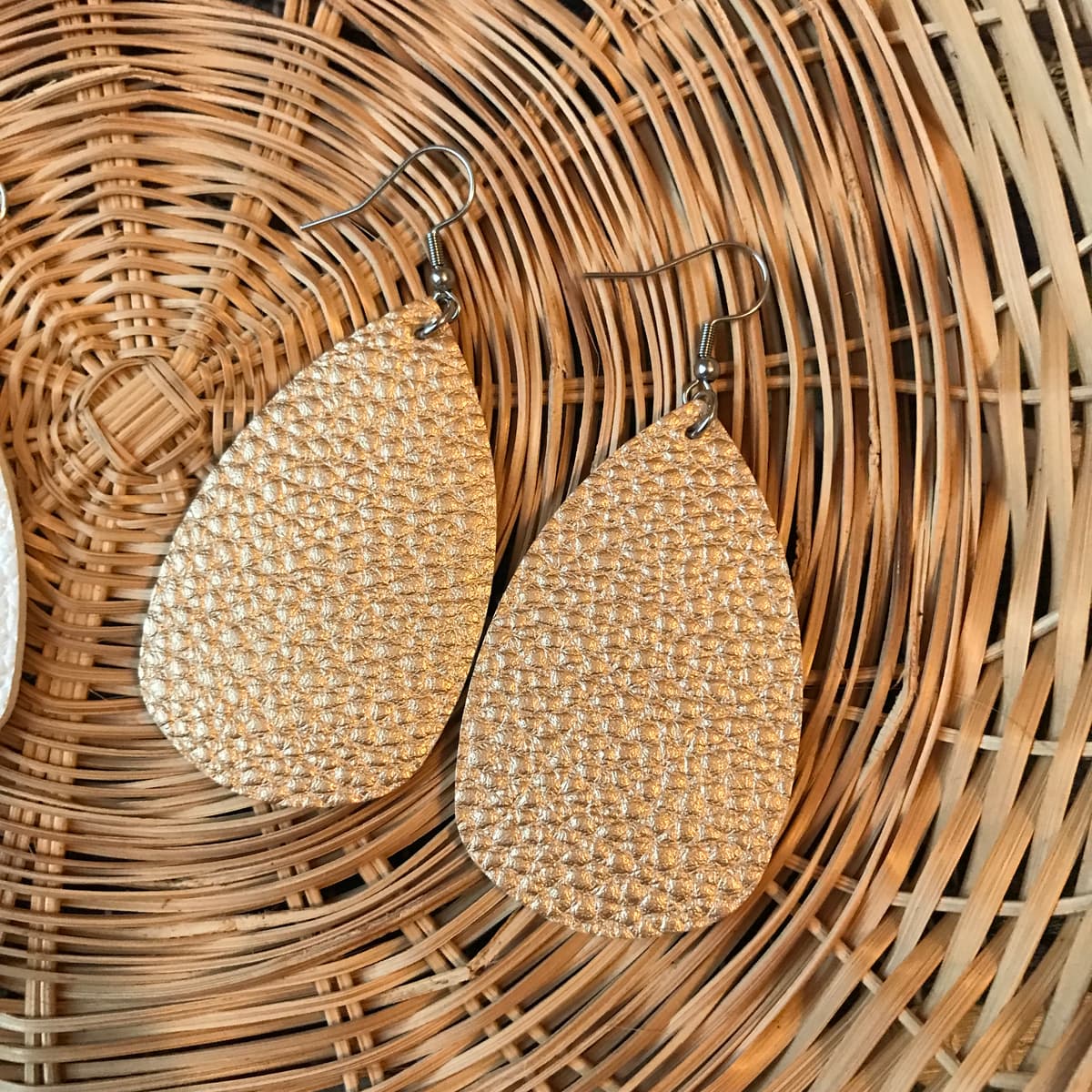 The selected image of Shiny Gold Pebble Textured Leather Earrings