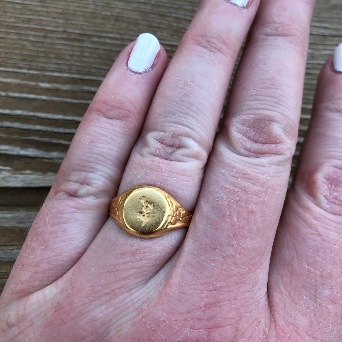 The selected image of 10k Gold Plated Floral Relief Ring (size 8)