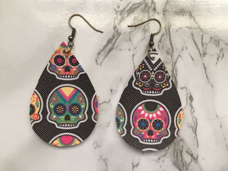 The selected image of Dia de Los Muertos Candy Skull Faux Leather Halloween Earrings