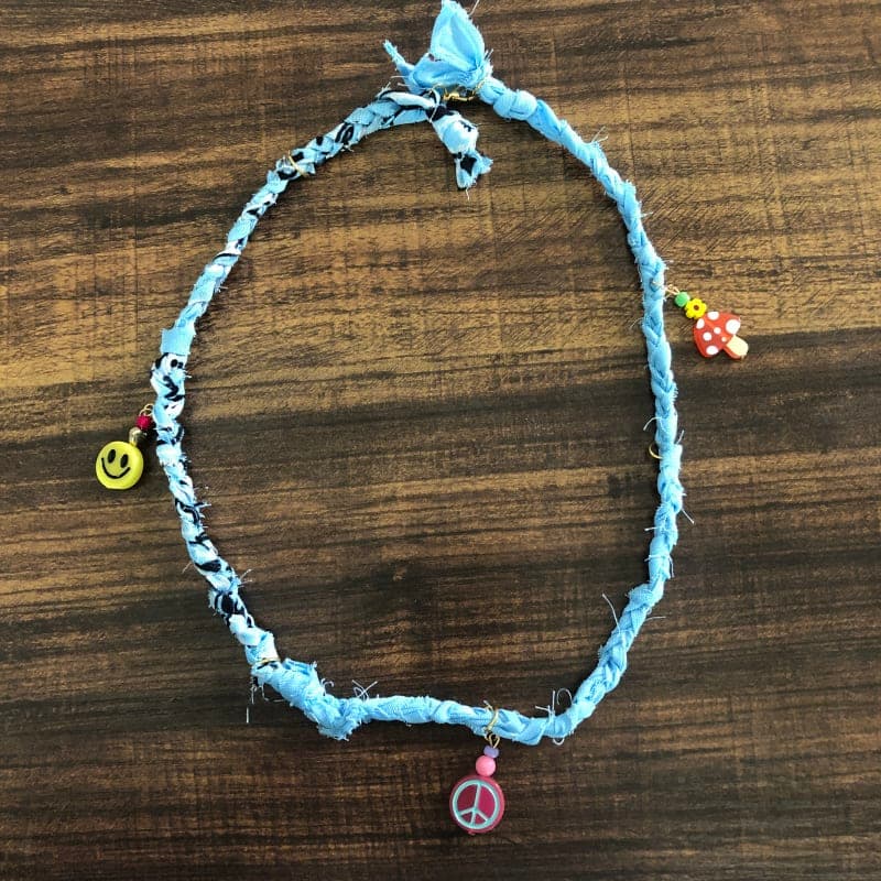 The selected image of Funky Charms Blue Bandana Necklace