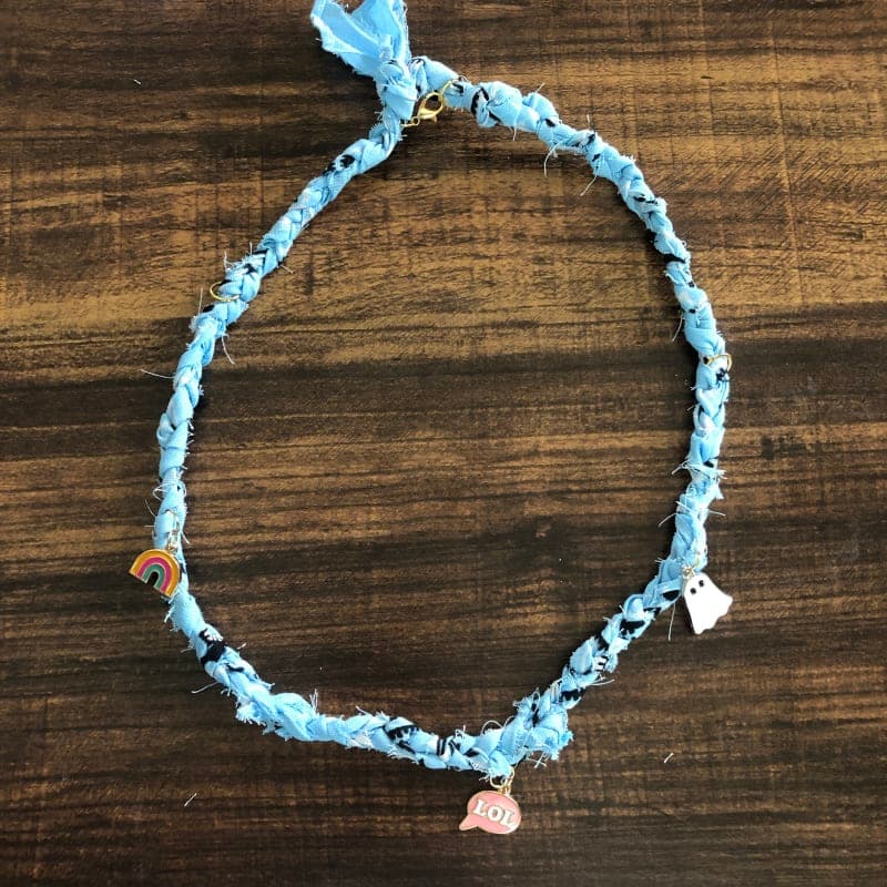 The selected image of Random Charms Fun Blue Bandana Necklace