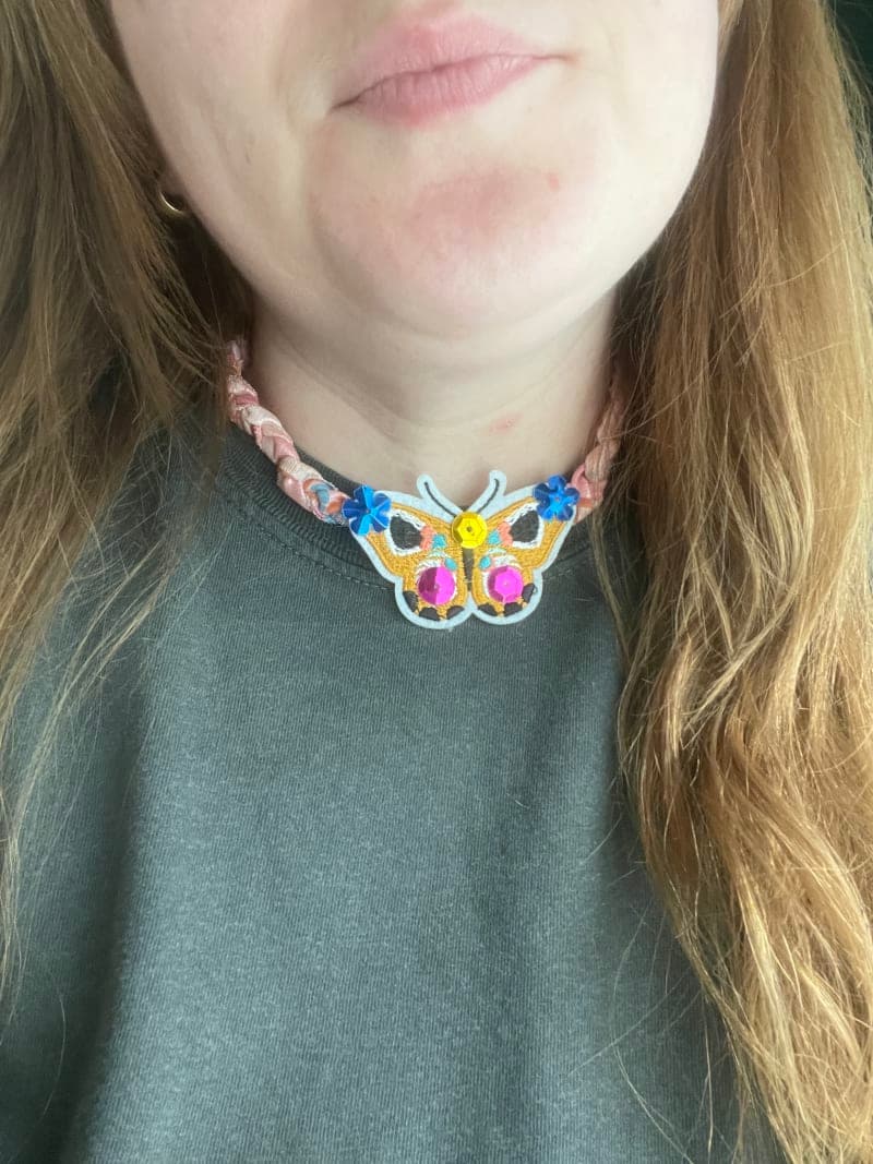 The selected image of Pink Floral Bandana Necklace with Butterfly