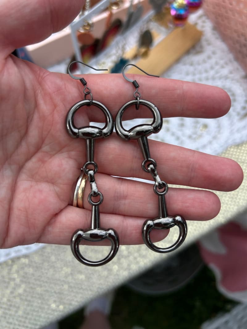 The selected image of Large Western Horse Bit Dangle Earrings in Charcoal Slate